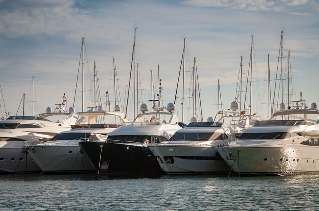 Yachts parked side by side.